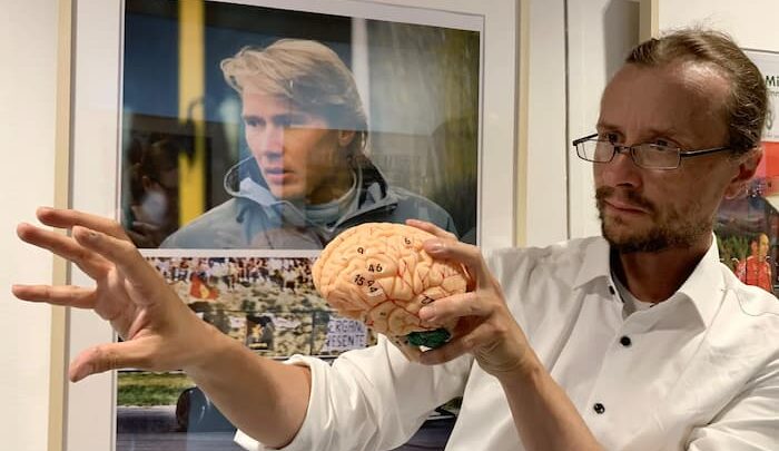 A Formula 1 driver's brain buys time where reflexes are already lagging behind
